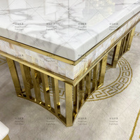 Table à manger en marbre blanc ivoire en gros, table à manger de luxe en acier inoxydable pour restaurant, ensemble de 6 chaises et tables dorées