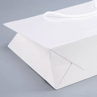 Sac de luxe haut de gamme en papier d'art blanc pour bijoux, chaussures, vêtements, emballage cadeau, sac de shopping avec poignée en corde de coton faite à la main, estampage à chaud