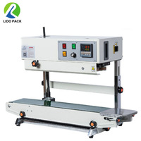 FR-900 Machine de scellage Vertical continu en acier inoxydable de haute qualité pour sacs en plastique