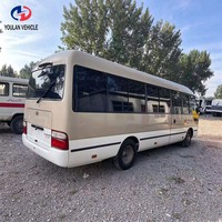 Autobus Coaster à essence économiques vendus en Chine, dotés de 23 sièges fixes et de 6 sièges pliants