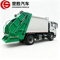 Camion à ordures compacteur arrière de 18 mètres cubes HOWO 6x4, camion de transport de déchets sanitaires