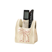 Boîte de rangement créative en céramique pour pinceaux de maquillage avec télécommande, support à stylos en forme de nœud, organisateur de bureau et de papeterie pour la maison