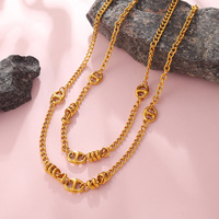 Nouveauté 2026 Collier Demi-luxe à fermoir double D en forme de nez de cochon, Chaîne en bambou plaqué or 18 carats, Polyvalent et Élégant