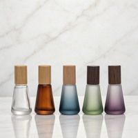 Flacon roll-on portable en verre de 12 ml pour soins de la peau, vaporisateur conique, échantillon vide, emballage de parfum, logo personnalisé, rechargeable