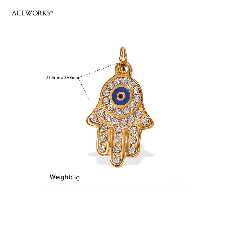 Hamsa pavée de spinelle clair avec mauvais œil bleu