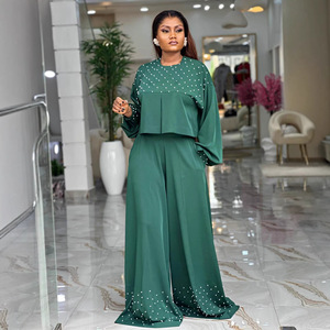 Ensemble long élégant pour <span class=keywords><strong>femme</strong></span>, style européen et américain, nouvelle collection été 2026, haut à col rond perlé et manches lanternes, <span class=keywords><strong>pantalon</strong></span> large, 100 % polyester - Product Image 1
