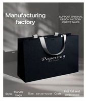 Sacs en papier biodégradables personnalisés pour supermarchés, design de luxe, papier cartonné enduit 300 g/m², couleur noire, impression de logo personnalisée, ruban