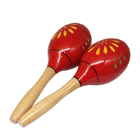 Maracas en bois à têtes rouges avec fleurs jaunes et vertes peintes à la main, boule de sable colorée de style dessin animé