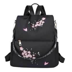 Mochila de diseño nueva, multifuncional, impermeable y antirrobo con estampado de cuadrícula. - Product Image 1