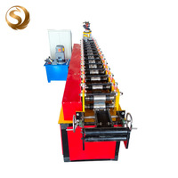 Machine de formage de rouleaux pour portes à enroulement à froid 82-121
