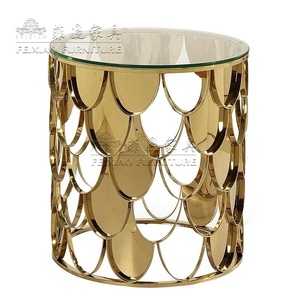 <span class=keywords><strong>Set</strong></span> moderno di <span class=keywords><strong>tavolini</strong></span> rotondi in acciaio inossidabile color <span class=keywords><strong>oro</strong></span> per sala da pranzo - Product Image 1