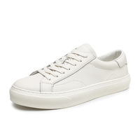 Baskets blanches en cuir véritable pour hommes, tendance automne, style européen, polyvalentes, décontractées, à lacets, chaussures plates pour le quotidien