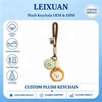 Porte-clés créatif en peluche à double suspension, personnage rond vert souriant, coutures soignées, sangle en corde tressée marron résistante, décoration