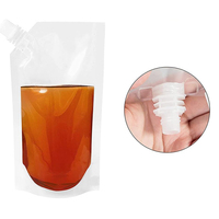 Sacs d'emballage transparents de qualité alimentaire personnalisés boissons debout sacs de buse de liquide de jus alimentaire extrudé pochette de sac de bec de boisson