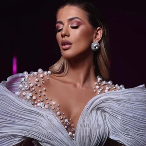 ชุดราตรีประดับมุกสุดหรูชุดแต่งงานลูกไม้สุดเซ็กซี่แบบผ่าข้างมีโบว์ผูกคอทำด้วยมือ2025 - Product Image 1