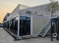 Maison conteneur pliable personnalisée de 20 pieds, maison modulaire préfabriquée avec terrasse, dortoir et bureau pour chantier de construction