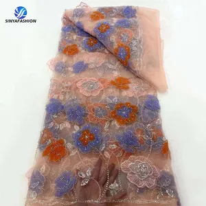 Sinya tecido bordado de malha de poliéster enrolado flor 3D luxuosa contas de lantejoulas bordado renda de tule