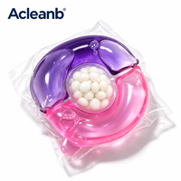 3-en-1 Capsules de lessive écologiques jetables en forme de Q avec billes parfumées, couleurs personnalisées, parfum, OEM, ODM, emballage marque privée