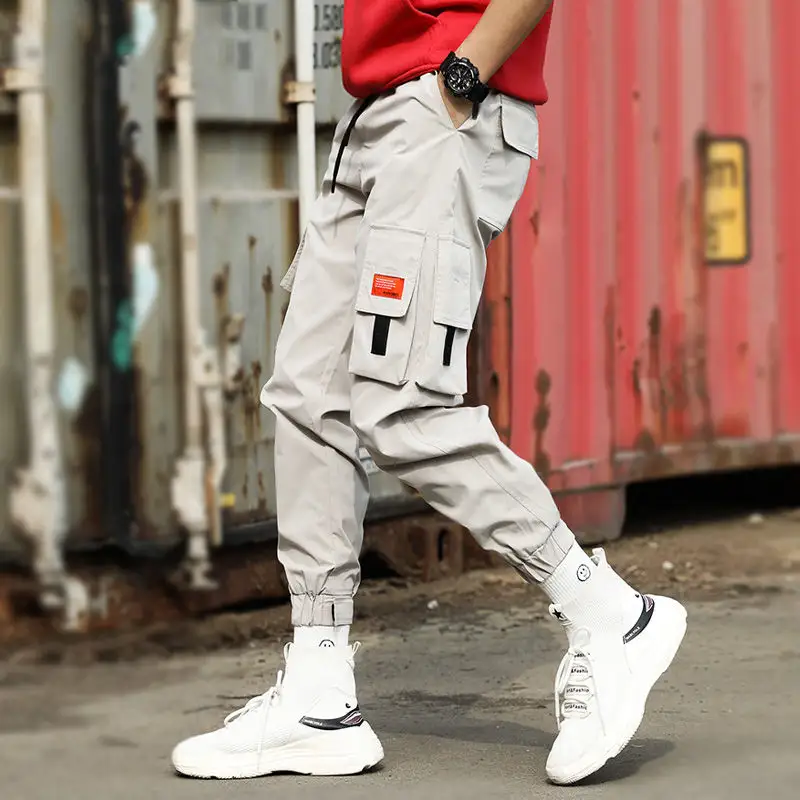 الرجال متعددة جيب مرونة الخصر تصميم سراويل نسائية الشارع فاسق الهيب هوب أحمر بناطيل كاجوال ركض الذكور الجيش البضائع السراويل