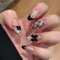 Faux ongles à presser en amande, style français, avec nœud et strass brillants, motifs floraux et pois