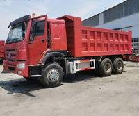 Truk HOWO NX 8x4 Self-unloading dengan Filter Udara Anti Debu untuk Perlindungan Mesin, Truk Tambang untuk Lokasi Kerja Berdebu