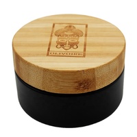 Pot à crème 30g 50g 100g en verre noir mat avec couvercle en bois pour les soins de la peau du visage, du corps et des yeux