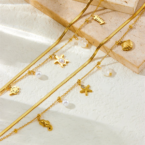 Tobillera Minimalista de Dos Capas con Diseño de Vida Marina, Cadena de Serpiente Chapada en Oro, Colgante de Caballito de Mar, Estrella de Mar, Concha, Perla y Flor Blanca, Tobillera Delicada - Product Image 3