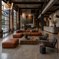 Ensemble de mobilier industriel pour hall d'hôtel avec canapé en cuir, fauteuils lounge, bureau de réception et buffet pour projets