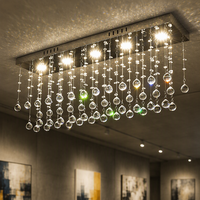 Lustre rectangulaire moderne et minimaliste à LED tricolore à intensité variable pour salle à manger et couloir, avec corps argenté et pendentifs en cristal