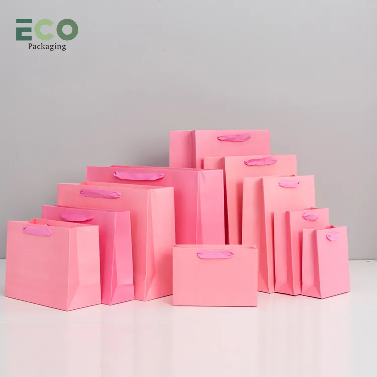 Sacchetto di carta regalo rosa economico opaco di marca di imballaggio in cartone Boutique di stoffa personalizzato con il proprio Logo per le piccole imprese