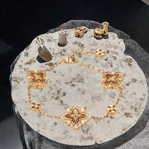 Bracelet tennis classique en acier inoxydable avec trèfle à quatre feuilles porte-bonheur, tendance unisexe, fleur en zircon, plaqué or, pour les fêtes - Product Image 3