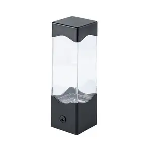 Vente en gros de lampes à lave en forme de tour en bouteille de verre lampe à lave décorative fantaisie de table à lumière LED