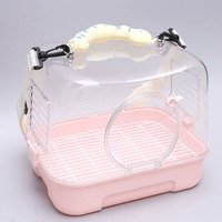 Cage de transport portable moderne et simple en plastique solide pour oiseaux, avec design panoramique à 360° et petite taille, idéale pour les voyages