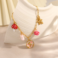 Bracelet à breloques en acier inoxydable plaqué or PVD, avec pendentifs variés (mushroom, rose, fleur), chaîne trombone, bijou de poignet pour femme
