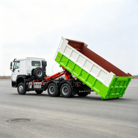 Camion benne à bras de levage Sinotruk Howo 6x4 robuste à double essieu arrière avec benne basculante pour déchets