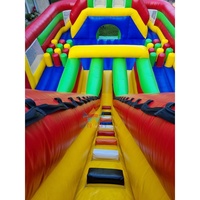 Parcours d'obstacles gonflable personnalisé en PVC rouge, jaune, vert et bleu avec toboggan à louer