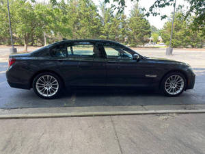 รถยนต์ปี 2014 ซีรีส์ 5 รุ่น 750Li XDrive ระบบขับเคลื่อนสี่ล้อ AWD เครื่องยนต์ 4 ลิตร 4 ประตู แบบซีดาน รุ่นที่สาม กล้องมองหลัง ซันรูฟ ไฟหน้า LED เบาะหนังสีเข้ม พวงมาลัยซ้าย ระบบสัมผัส 8 จุด - Product Image 4