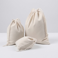 Pochette en coton réutilisable écologique robuste avec cordon de serrage, sac cadeau personnalisé avec logo et motif lettres couleur naturelle pour promotion