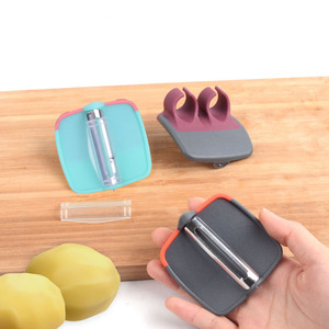 Gadgets de cuisine créatifs Éplucheurs à double doigt en plastique et acier inoxydable Éplucheur de pomme et de <span class=keywords><strong>palme</strong></span> pour légumes - Product Image 2