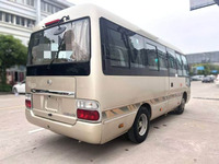 Bus d'occasion 2021 Chine Coaster Économique Moteur ISUZU 19 places Transmission Manuelle Conduite à Gauche Norme d'Émission JMC 91-110 Km/h
