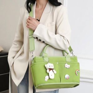 กระเป๋าใส่รถเข็นเด็กทันสมัยและมีสไตล์ พร้อมฝาปิดแม่เหล็ก กระเป๋าใส่ผ้าอ้อม - Product Image 2