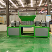 Déchiqueteuse à double arbre en plastique durable, machine de déchiquetage robuste pour le recyclage des déchets plastiques