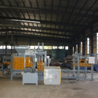 Machine de production automatique de blocs de ciment hydrauliques QT8-15