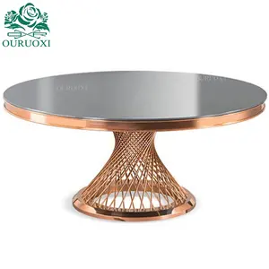 Table dorée de mariage en acier inoxydable, design moderne nid en verre, table d'événements