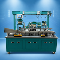 Machine d'assemblage de stylos à bille avec alimentateur vibrant et orientation des pièces