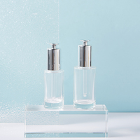 Nouveauté : Emballage en verre haut de gamme pour soins de la peau : flacons compte-gouttes pour huiles essentielles de 30 ml et flacons à pompe dorée pour sérum de 40 ml