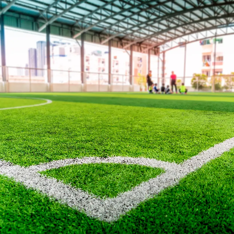 Erba artificiale del tappeto erboso di FIFA 23 per il tappeto del campo di calcio del campo da calcio dell'interno del campo dello stadio di calcio