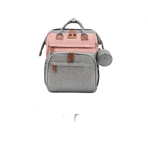 Muestras gratis: Mochilas de moda para pañales de viaje con cambiador y estuche para chupete, bolsas multiusos para pañales de bebé al por mayor - Product Image 1