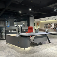 Bureau de direction moderne de luxe en forme de L avec armoire latérale rotative, serrure à empreinte digitale intégrée et table de bureau coulissante électrique