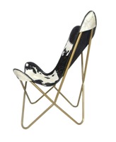 Fauteuil papillon de luxe en cuir véritable avec structure robuste et assise moelleuse pour une expérience de détente optimale dans le salon ou la chambre.